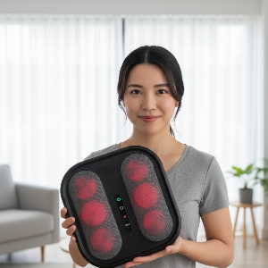 Woman holding a black Bodyrevive 3D massager with red lights in a living room setting